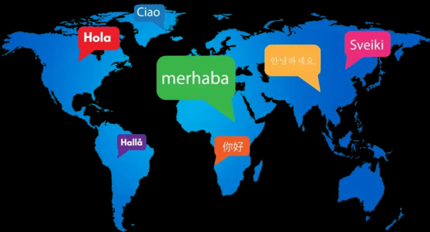 A world map with speech bubbles greeting in seven languages